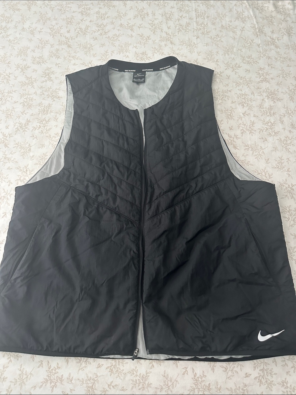 Nike Men’s Black Reversible Quilted Vest with White Swoosh